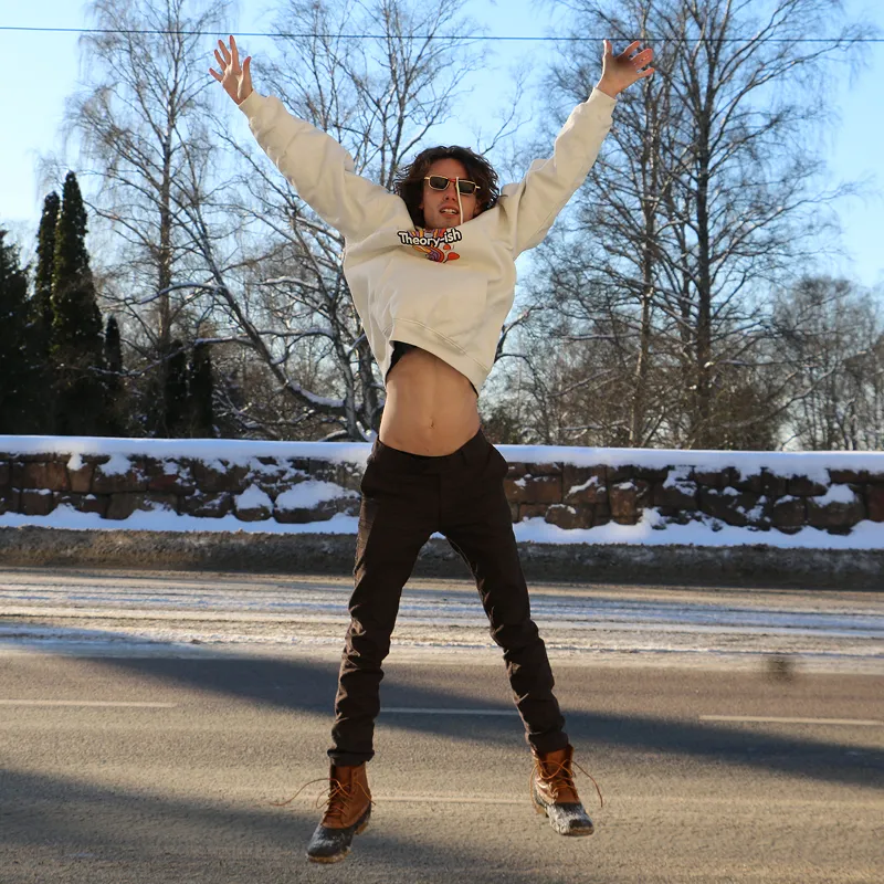 Dancer with arms raised